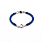 bracciale cordoncino azzurro e coccu centrale